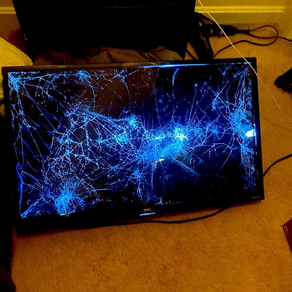 Roku TCL Television - Screen and Glass shattered
